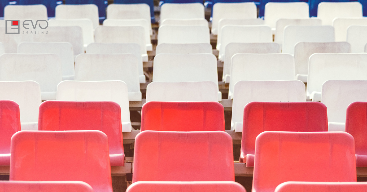 Technicians installing bleachers and providing maintenance